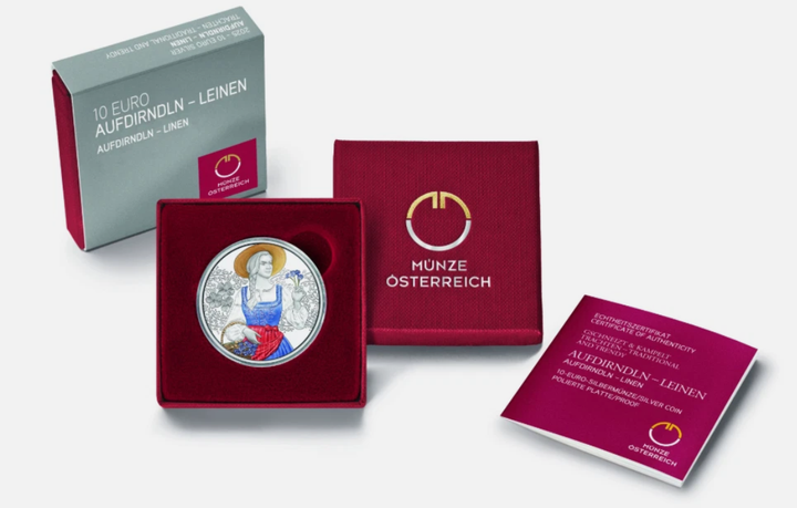 Срібна монета 10 євро Традиції та мода. Дірндль 16.82 грам Proof 925 проба 2025 року у футлярі. Кольорове покриття - Фото 2 Срібна монета 10 євро Традиції та мода. Дірндль 16.82 грам Proof 925 проба 2025 року у футлярі. Кольорове покриття - изображение 2