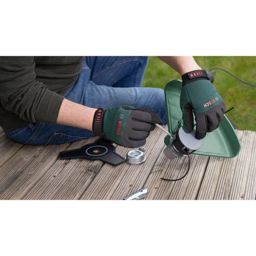 Тример садовий Bosch AFS 23-37 1000Вт, ліска 37см, ніж 23см, 5.7кг (0.600.8A9.000) BOSCH 0.600.8A9.000 991660 - Фото 9 Тример садовий Bosch AFS 23-37 1000Вт, ліска 37см, ніж 23см, 5.7кг (0.600.8A9.000) BOSCH 0.600.8A9.000 991660 - зображення 9