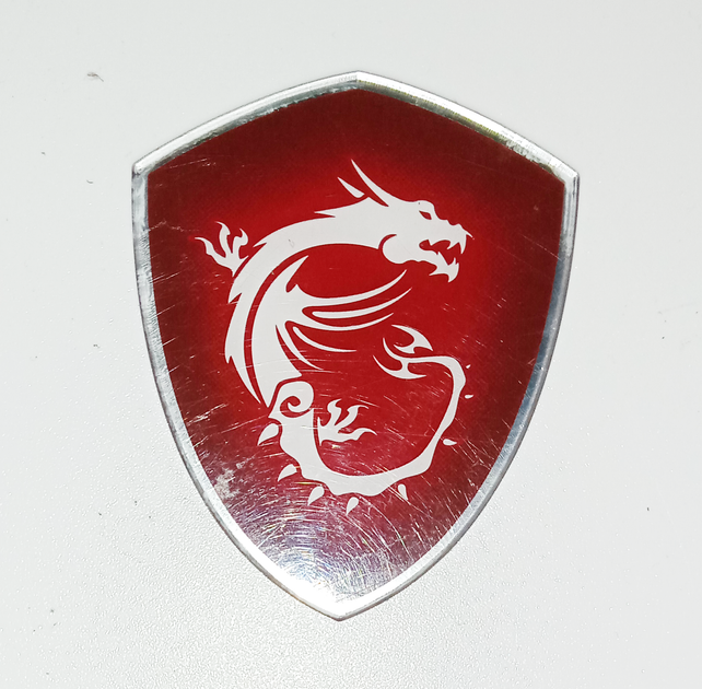 Логотип MSI з кришки матриці GS63 GF63 Б/В - Фото 1 Логотип MSI з кришки матриці GS63 GF63 Б/В - зображення 1