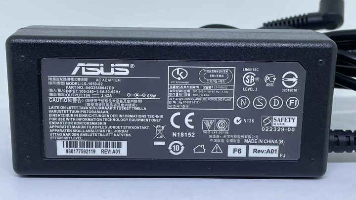 Блок живлення для ноутбука ASUS 19 V 3.42 A 65 W 4.0*1.35 mm - Фото 1 Блок живлення для ноутбука ASUS 19 V 3.42 A 65 W 4.0*1.35 mm - зображення 1