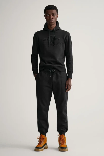 Чоловічі чорні спортивні штани TONAL ARCHIVE SHIELD PANTS Gant L 2039023 - Фото 6 Чоловічі чорні спортивні штани TONAL ARCHIVE SHIELD PANTS Gant L 2039023 - изображение 6