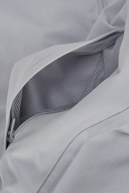 Чоловіча світло-сіра вітровка UA Rival Wvn Windbreaker Under Armour M 1390149-011 - Фото 7 Чоловіча світло-сіра вітровка UA Rival Wvn Windbreaker Under Armour M 1390149-011 - изображение 7