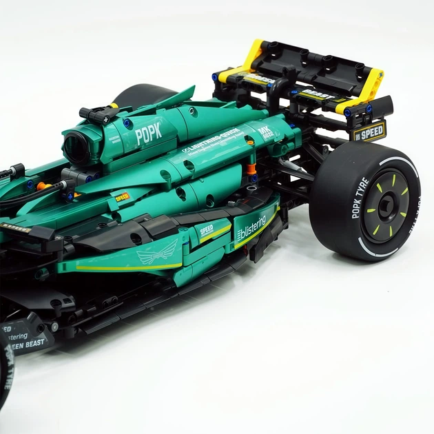 Конструктор Technic Aston Martin AMR25 F1 1:8 - 1912 елементів, болід Формули-1 2025, 65 см - Фото 7 Конструктор Technic Aston Martin AMR25 F1 1:8 - 1912 елементів, болід Формули-1 2025, 65 см - зображення 7