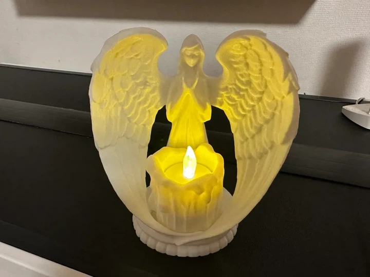 Свічник-статуетка янгол що обіймає крилами з LED-свічкою. Aivory - изображение 2