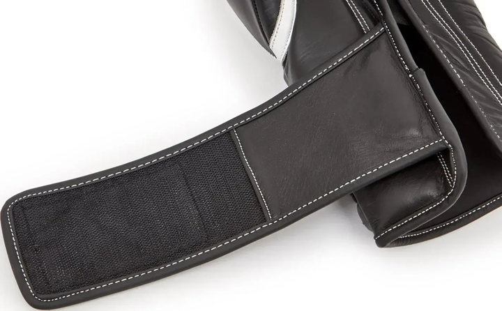 Боксерські рукавиці Reebok Combat Leather Boxing Gloves 10 унцій, чорно-білі - Фото 2 Боксерські рукавиці Reebok Combat Leather Boxing Gloves 10 унцій, чорно-білі - изображение 2