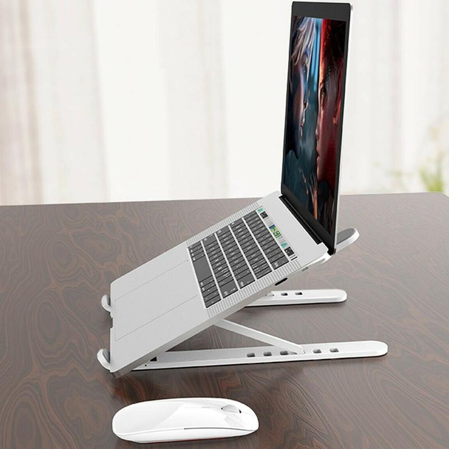 Подставка для ноутбука или планшета Holder 15.6" складная регулируемая по высоте из прочного пластика White - Фото 13 Подставка для ноутбука или планшета Holder 15.6" складная регулируемая по высоте из прочного пластика White - изображение 13