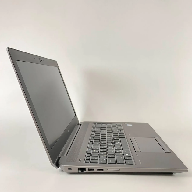 Мобильная рабочая станция HP zBook 15 G6 / 15.6" (1920x1080) IPS / Intel Core i7-9850H (6 (12) ядер по 2.6 - 4.6 GHz) / 16 GB DDR4 / 240 GB SSD / nVidia Quadro T1000, 4 GB GDDR5, 128-bit / WebCam / Fingerprint б/у + Подарок Беспроводная мышь / USB - Фото 4 Мобильная рабочая станция HP zBook 15 G6 / 15.6" (1920x1080) IPS / Intel Core i7-9850H (6 (12) ядер по 2.6 - 4.6 GHz) / 16 GB DDR4 / 240 GB SSD / nVidia Quadro T1000, 4 GB GDDR5, 128-bit / WebCam / Fingerprint б/у + Подарок Беспроводная мышь / USB - изображение 4