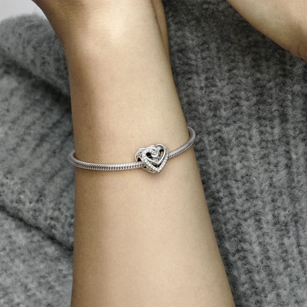 Серебряный шарм Pandora «Блестящие переплетенные сердца» Серебряная бусина Пандора Сердце Паве Переплетение 799270C01 - Фото 6 Серебряный шарм Pandora «Блестящие переплетенные сердца» Серебряная бусина Пандора Сердце Паве Переплетение 799270C01 - изображение 6