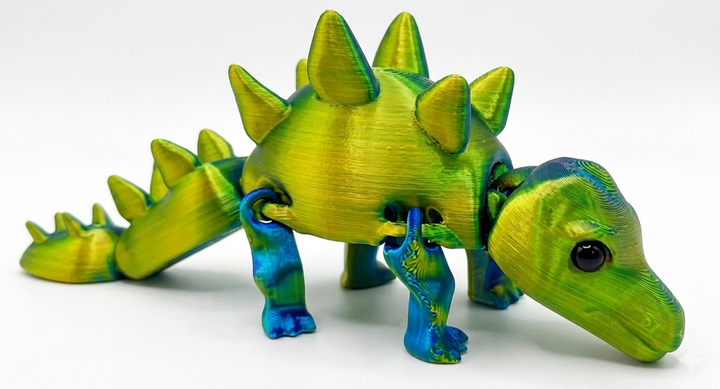 3D-игрушка антистресс Подвижный Динозавр (19х8х7 см) - Зеленый - Фото 1 3D-игрушка антистресс Подвижный Динозавр (19х8х7 см) - Зеленый - изображение 1