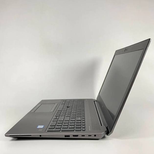 Мобильная рабочая станция Б-класс HP ZBook 15 G5 / 15.6" (1920x1080) IPS / Intel Core i7-8850H (6 (12) ядра по 2.6 - 4.3 GHz) / 16 GB DDR4 / 256 GB SSD / nVidia Quadro P1000, 4 GB GDDR5, 256-bit / Fingerprint / WebCam б/у + Подарок Беспроводная мышь / USB - Фото 5 Мобильная рабочая станция Б-класс HP ZBook 15 G5 / 15.6" (1920x1080) IPS / Intel Core i7-8850H (6 (12) ядра по 2.6 - 4.3 GHz) / 16 GB DDR4 / 256 GB SSD / nVidia Quadro P1000, 4 GB GDDR5, 256-bit / Fingerprint / WebCam б/у + Подарок Беспроводная мышь / USB - изображение 5