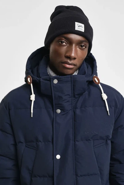 Чоловіча чорна шапка DOUBLE LAYERED BEANIE Gant OS 9910031 - Фото 2 Чоловіча чорна шапка DOUBLE LAYERED BEANIE Gant OS 9910031 - изображение 2