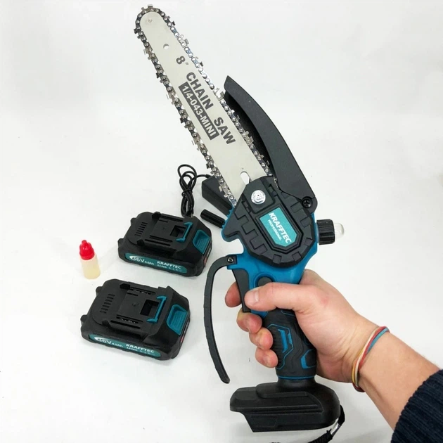 Аккумуляторная мини цепная пила Krafftec 36V 4Ah с двумя аккумуляторами бесщеточным двигателем двумя шинами 15 см тремя цепями автоматической смазкой - изображение 6