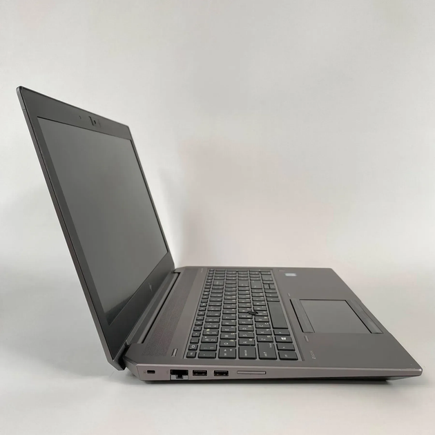 Мобильная рабочая станция Б-класс HP zBook 15 G6 / 15.6" (1920x1080) IPS / Intel Core i7-9850H (6 (12) ядер по 2.6 - 4.6 GHz) / 16 GB DDR4 / 128 GB SSD + 500 GB HDD / nVidia Quadro T1000, 4 GB GDDR5, 128-bit / Fingerprint / HDMI б/у + Подарок Мышь / USB - Фото 4 Мобильная рабочая станция Б-класс HP zBook 15 G6 / 15.6" (1920x1080) IPS / Intel Core i7-9850H (6 (12) ядер по 2.6 - 4.6 GHz) / 16 GB DDR4 / 128 GB SSD + 500 GB HDD / nVidia Quadro T1000, 4 GB GDDR5, 128-bit / Fingerprint / HDMI б/у + Подарок Мышь / USB - изображение 4