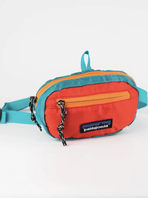 Сумка через плечо/на пояс Patagonia Ultralight Hole Mini Hip Pack в бирюзово-красном цвете. - Фото 3 Сумка через плечо/на пояс Patagonia Ultralight Hole Mini Hip Pack в бирюзово-красном цвете. - изображение 3