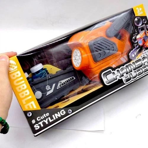 Игрушечная бензопила YG Toys с мыльными пузырями и светом серо-оранжевая - Фото 3 Игрушечная бензопила YG Toys с мыльными пузырями и светом серо-оранжевая - изображение 3