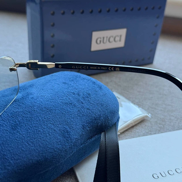 Солнцезащитные очки модели Gucci GG1221S 001 - светло черная линза - изображение 2