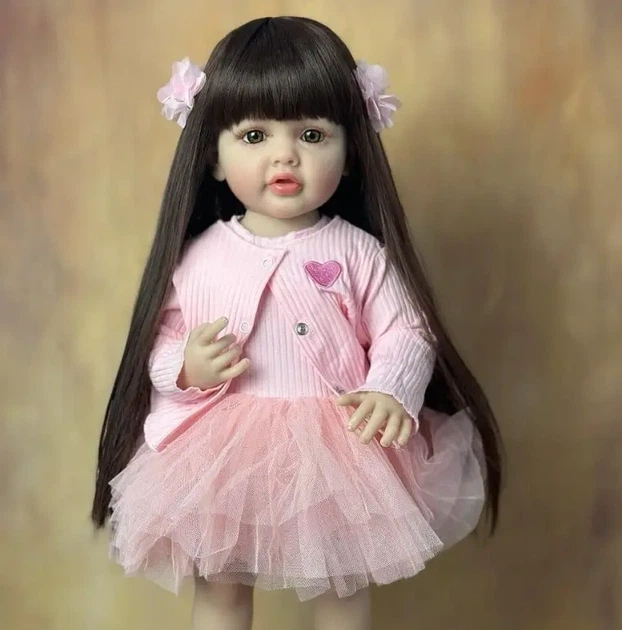 Лялька Reborn Baby Doll Olivia 55 см у рожевій сукні вінілова з волоссям та аксесуарами, можна купати - изображение 4
