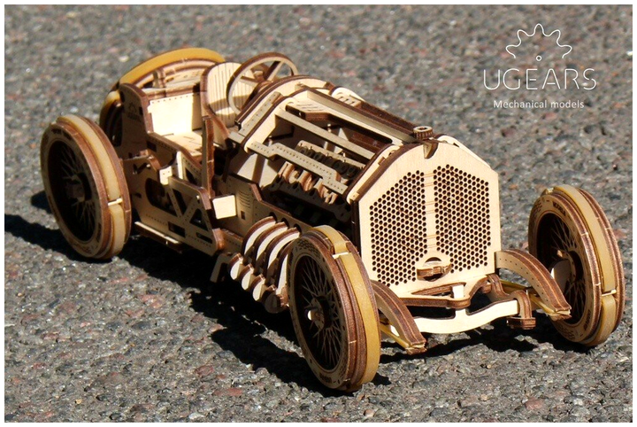 3D пазл механический деревянный спорткар 348 деталей для сборки UGEARS MC-4733 - Фото 8 3D пазл механический деревянный спорткар 348 деталей для сборки UGEARS MC-4733 - изображение 8