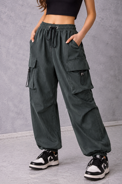 Жіночі широкі карго штани oversize з кишенями M — брюки вільного крою у стилі streetwear - Фото 1 Жіночі широкі карго штани oversize з кишенями M — брюки вільного крою у стилі streetwear - зображення 1