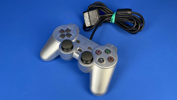 Набор Консоль Sony PlayStation 2 Slim SCPH-7xxx Limited Edition Chip Silver Б/У + Геймпад Проводной DualShock 2 - изображение 7