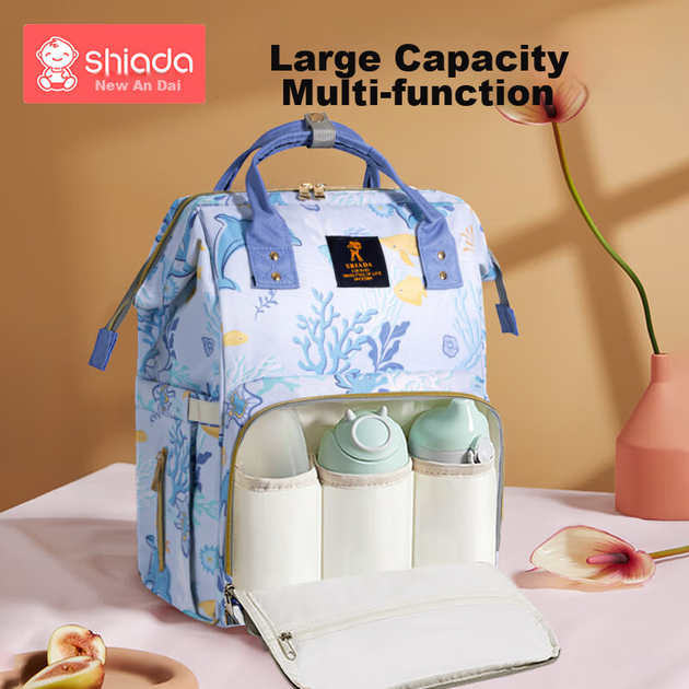 Рюкзак Xinandai Mommy Bag, місткий багатофункціональний рюкзак для подорожей, годування груддю та догляду за дитиною, легкий і зручний, колір Blue Sea Phantom. - зображення 5