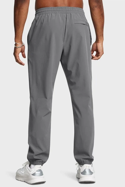Чоловічі сірі спортивні штани UA Vibe Woven Jogger сірі Under Armour M 1386557-025 - Фото 3 Чоловічі сірі спортивні штани UA Vibe Woven Jogger сірі Under Armour M 1386557-025 - зображення 3