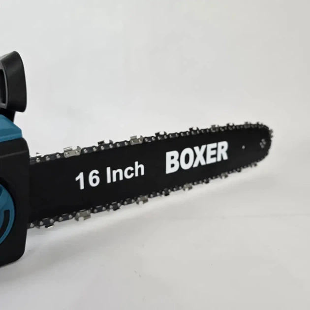 Електропила Boxer BX-3306 ланцюгова мережева електрична пила садова для розпилювання деревини обрізання гілок заготівлі дров 2200 Вт 220 В шина 40 см швидкість 8 м сек автозмащення металевий корпус поперечний двигун - Фото 6 Електропила Boxer BX-3306 ланцюгова мережева електрична пила садова для розпилювання деревини обрізання гілок заготівлі дров 2200 Вт 220 В шина 40 см швидкість 8 м сек автозмащення металевий корпус поперечний двигун - зображення 6