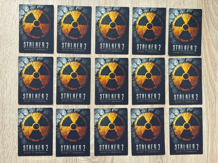S.T.A.L.K.E.R. 2 : Серце Чорнобиля Артефакти сувенірні колекційні картки України набір 15 штук (Тираж: 1000шт) - Фото 2 S.T.A.L.K.E.R. 2 : Серце Чорнобиля Артефакти сувенірні колекційні картки України набір 15 штук (Тираж: 1000шт) - зображення 2