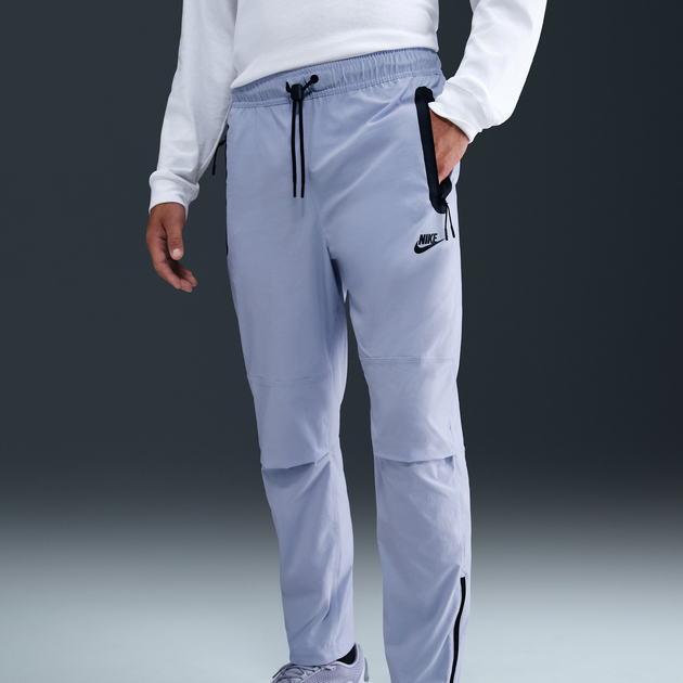 Брюки чоловічі Nike Tech Woven Blue M Синій HM8241-057 - Фото 1 Брюки чоловічі Nike Tech Woven Blue M Синій HM8241-057 - зображення 1