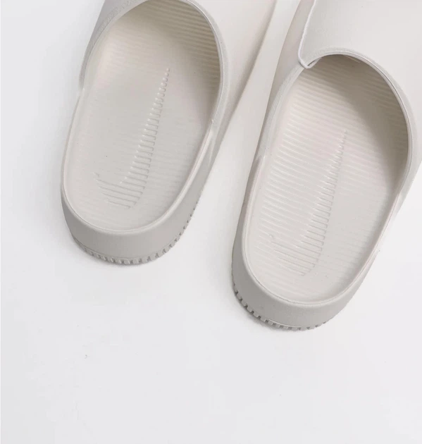 Тапочки мужские Nike Calm Slide 42.5 Белый FD4116-100 - Фото 6 Тапочки мужские Nike Calm Slide 42.5 Белый FD4116-100 - изображение 6