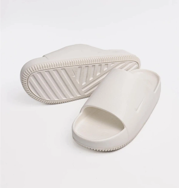 Тапочки мужские Nike Calm Slide 42.5 Белый FD4116-100 - Фото 7 Тапочки мужские Nike Calm Slide 42.5 Белый FD4116-100 - изображение 7