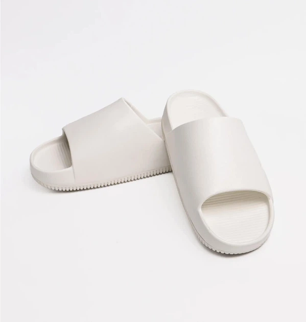 Тапочки мужские Nike Calm Slide 42.5 Белый FD4116-100 - Фото 8 Тапочки мужские Nike Calm Slide 42.5 Белый FD4116-100 - изображение 8
