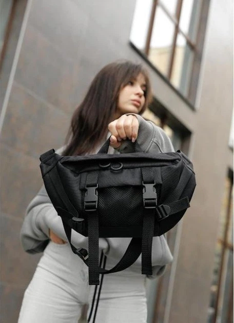 Велика жіноча поясна сумка бананка з поліестеру міська Sambag DynamicDart трансформер, чорна 60506 - Фото 5 Велика жіноча поясна сумка бананка з поліестеру міська Sambag DynamicDart трансформер, чорна 60506 - зображення 5
