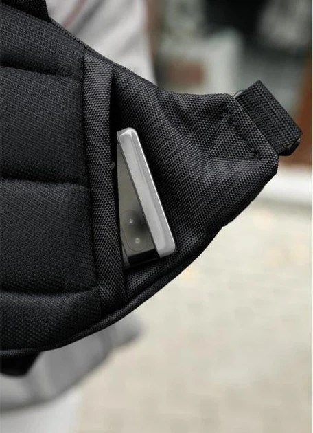 Велика жіноча поясна сумка бананка з поліестеру міська Sambag DynamicDart трансформер, чорна 60506 - Фото 8 Велика жіноча поясна сумка бананка з поліестеру міська Sambag DynamicDart трансформер, чорна 60506 - зображення 8