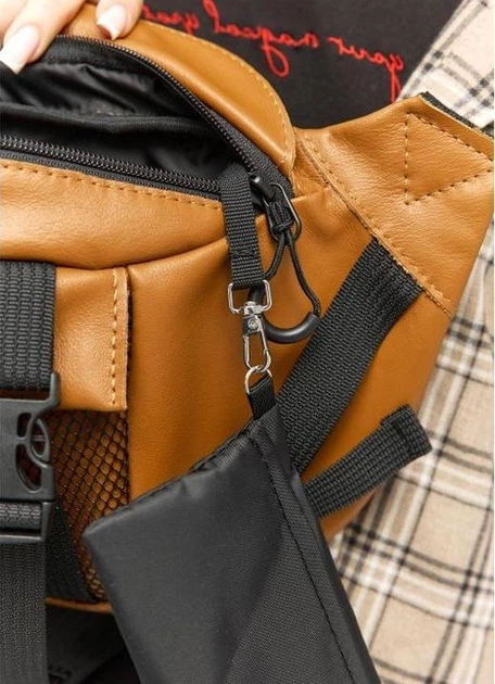 Большая женская поясная сумка бананка из натуральной кожи городская Sambag DynamicDart, рыжая 60510 - Фото 9 Большая женская поясная сумка бананка из натуральной кожи городская Sambag DynamicDart, рыжая 60510 - изображение 9