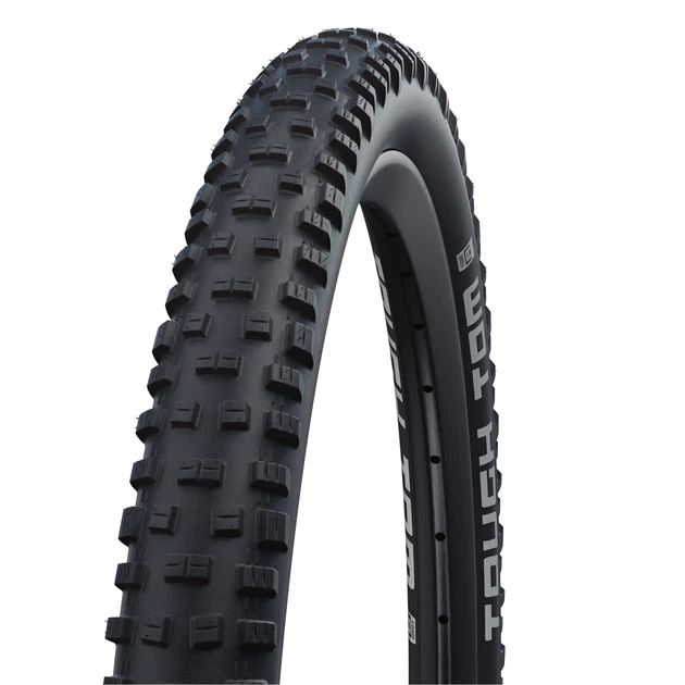 Покрышка Schwalbe Tough Tom 29x2.25 K-Guard, чёрная - Фото 1 Покрышка Schwalbe Tough Tom 29x2.25 K-Guard, чёрная - изображение 1