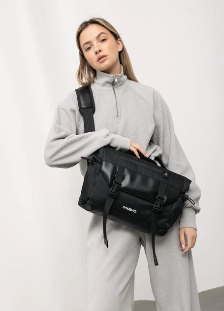Жіноча сумка для ноутбука Sambag 33х26х11 см екошкіра з перфорацією чорна - Фото 1 Жіноча сумка для ноутбука Sambag 33х26х11 см екошкіра з перфорацією чорна - зображення 1