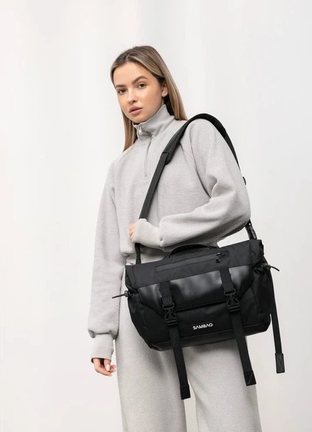 Жіноча сумка для ноутбука Sambag 33х26х11 см екошкіра з перфорацією чорна - Фото 4 Жіноча сумка для ноутбука Sambag 33х26х11 см екошкіра з перфорацією чорна - зображення 4