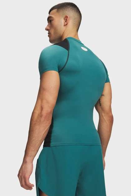 Чоловіча зелена футболка UA HG Elite Comp SS Under Armour S 6015382-338 - Фото 2 Чоловіча зелена футболка UA HG Elite Comp SS Under Armour S 6015382-338 - зображення 2