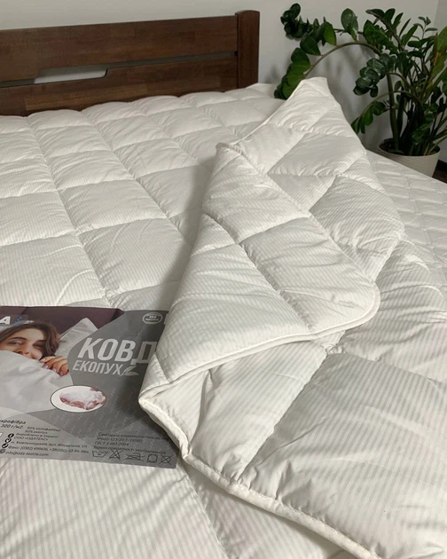 Одеяло Экопух полуторное 155x210 см 300г/м2 "Ода" - Фото 6 Одеяло Экопух полуторное 155x210 см 300г/м2 "Ода" - изображение 6