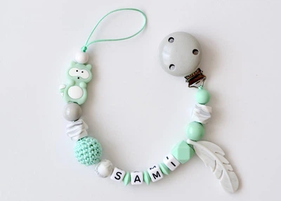 Прорезыватель - держатель для пустышки Babymall Mint Raccoon -COPY-
