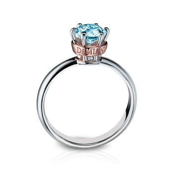 Золотое кольцо с натуральным голубым бриллиантом 0,62ct. в комбинированном золоте Elegance (888994)