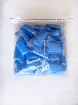 Трусики - стрінги одноразові із спанбонду Doily 50 шт блакитні