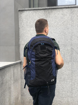 Универсальный туристический рюкзак 55 литров из влагоотталкивающей ткани черно синий