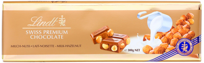 Шоколад молочний Lindt Milk Hazelnut Gold з фундуком 300 г (7610400013864)