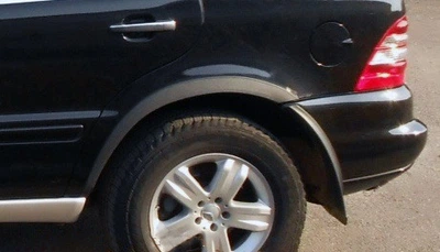 Накладки на арки (4 шт, чорний метал) для Mercedes ML W163 1997-2005 рр