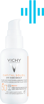 Lekki fluid przeciwsłoneczny Vichy Capital Soleil przeciw oznakom fotostarzenia skóry twarzy z uniwersalnym pigmentem tonującym SPF 50+ 40 ml (3337875795265)