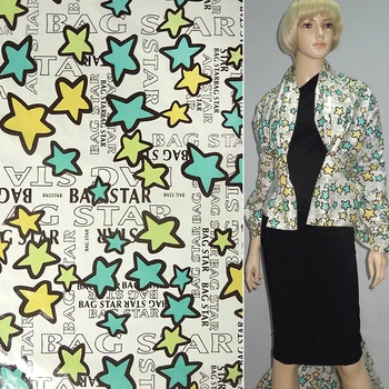 Ткань плащевая белая в разноцветные звезды "BAGSTAR" ш.145 (13538.002)