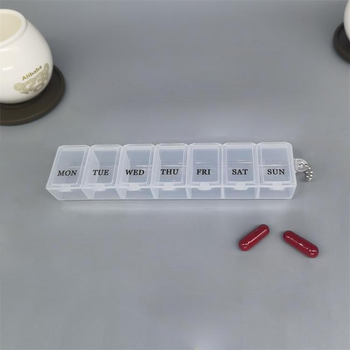 Таблетниця органайзер для таблеток на 7 комірок 1 тиждень з ланцюжком Прозорий