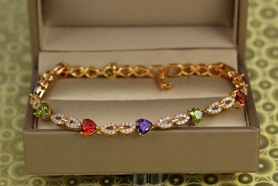 Браслет Xuping Jewelry Праздник с темными разноцветными камнями 19 см 5 мм золотистый